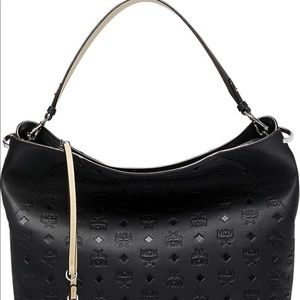 Gently used MCM Large Klara Monogram Leather Hobo.